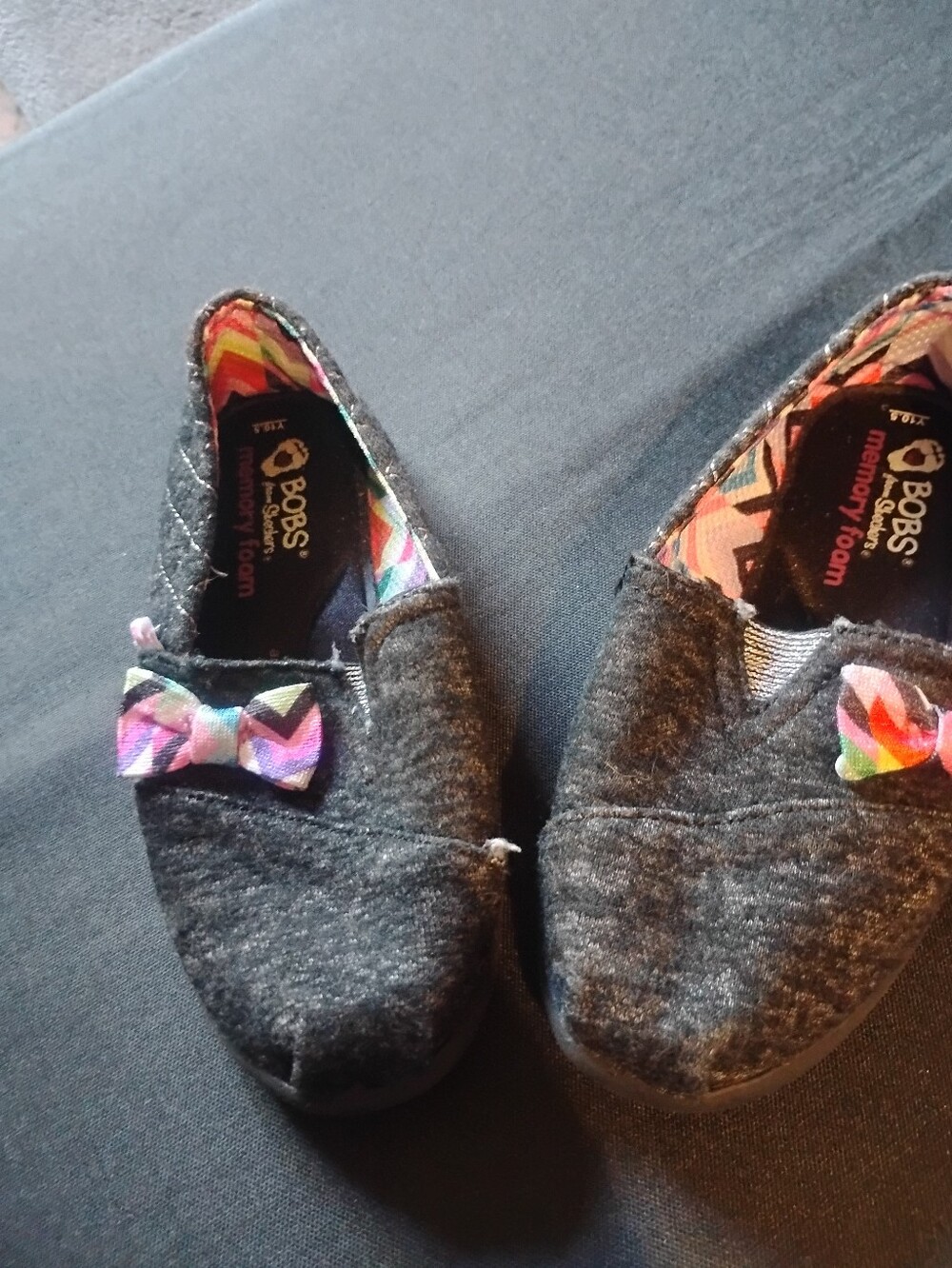 BOBS from Skechers Black Girls Slip-On Shoes with Multicolor Bow
